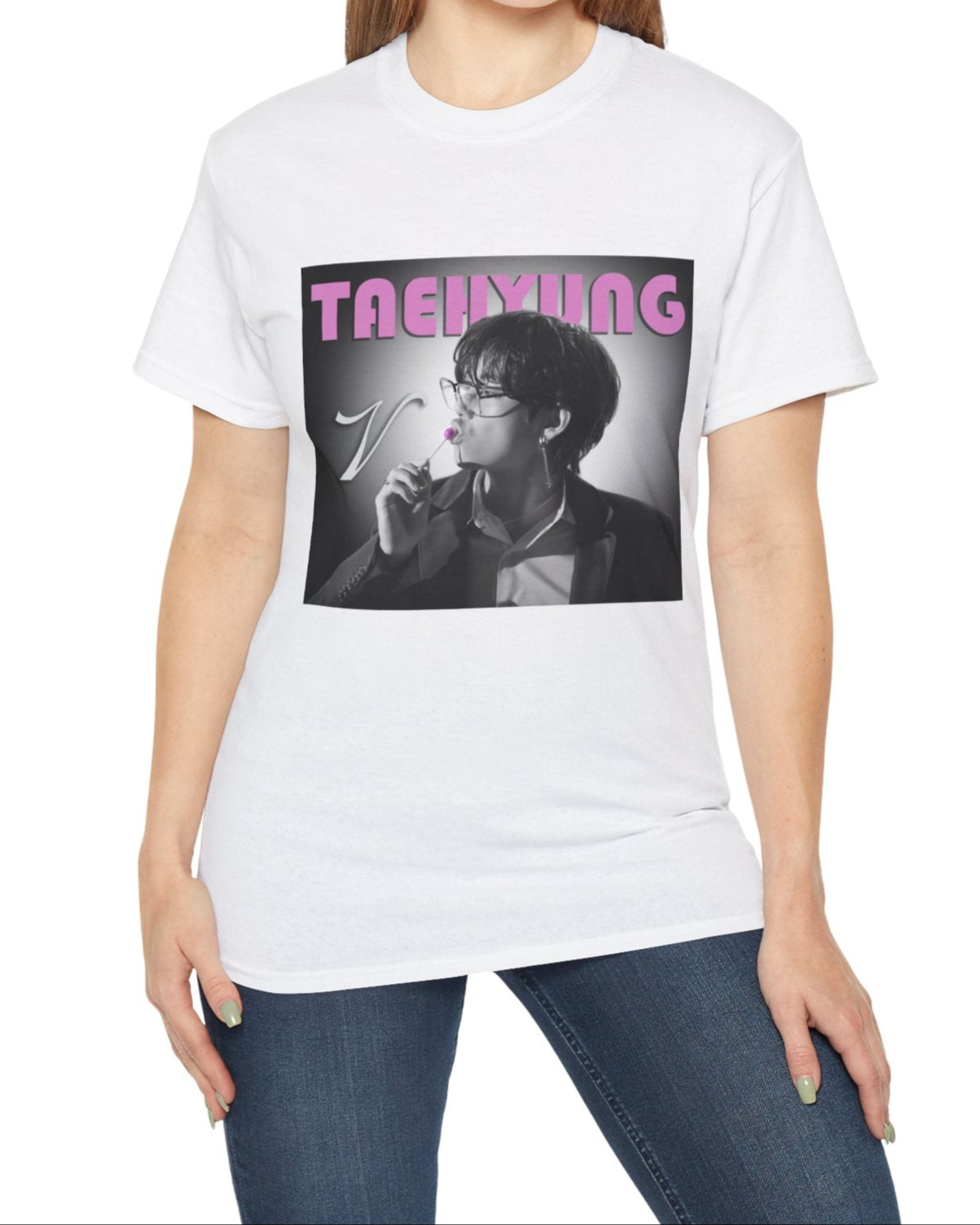 V Taehyung BTS unisex t-shirt in white, featuring a black-and-white design with a pink lollipop and vintage pink lettering. Printed on 100% US cotton, ethically made and Oeko-Tex certified. ModeK Vetements.
