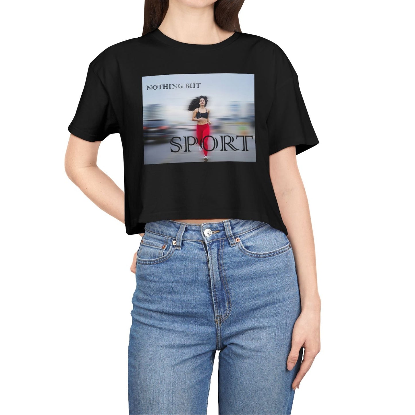 Women’s crop t-shirt in black from midweight 100% combed cotton with a relaxed fit. Features a centered design of a runner in motion against a blurry background and the text “NOTHING BUT SPORT.” — From ModeK Vetements.