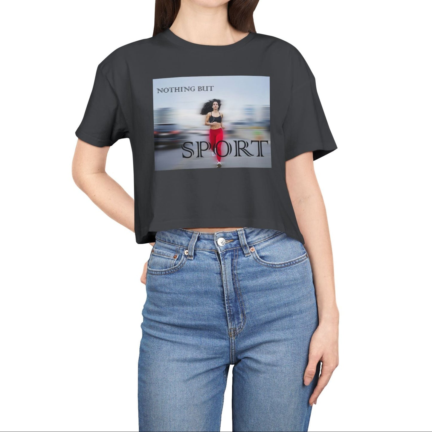 Women’s crop t-shirt in coal from midweight 100% combed cotton with a relaxed fit. Features a centered design of a runner in motion against a blurry background and the text “NOTHING BUT SPORT.” — From ModeK Vetements.