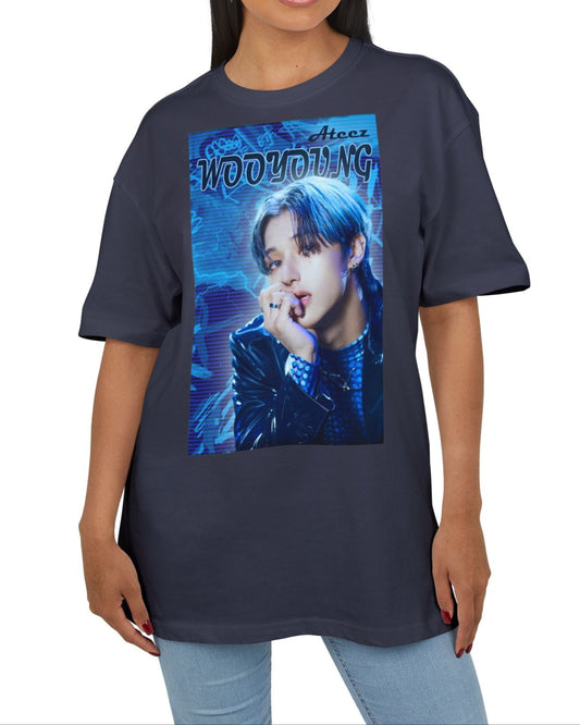 Unisex oversized cotton T-shirt in navy, featuring Wooyoung of ATEEZ in a graffiti-style design with electric blue tones, glowing silhouette, race car font, and purple scan lines. From ModeK Vetements.