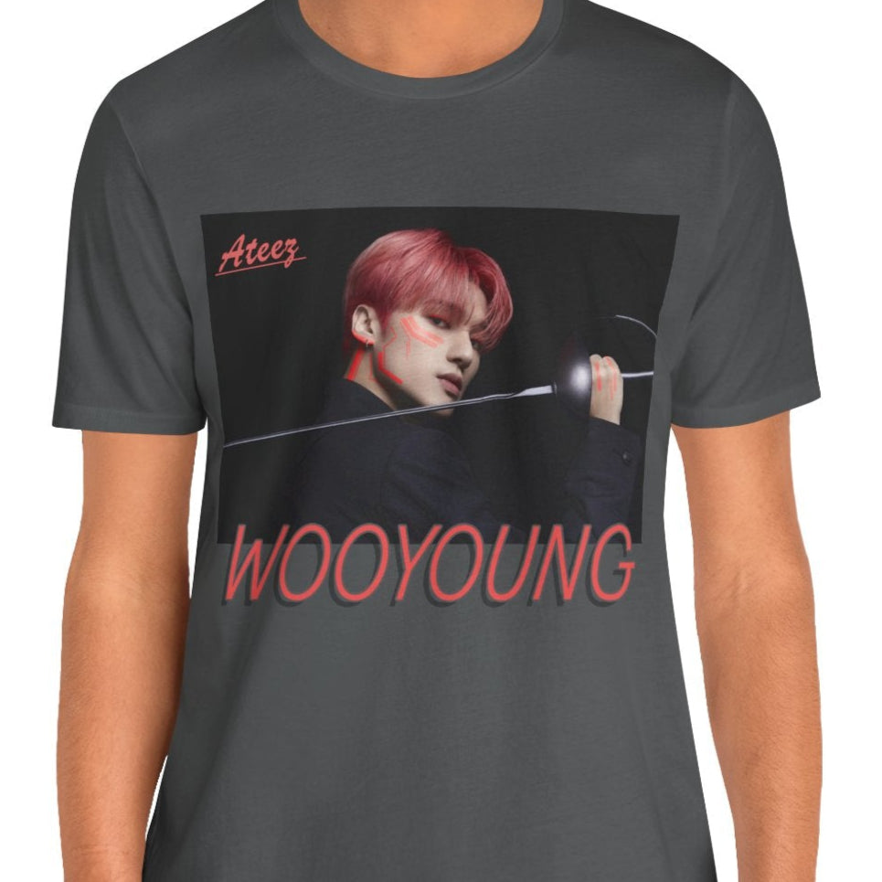 Wooyoung ATEEZ Unisex T-Shirt in asphalt, featuring a striking design of Wooyoung wielding a sword, his pink-red hair and sharp cheekbones illuminated by dynamic lighting. A must-have for ATINY.