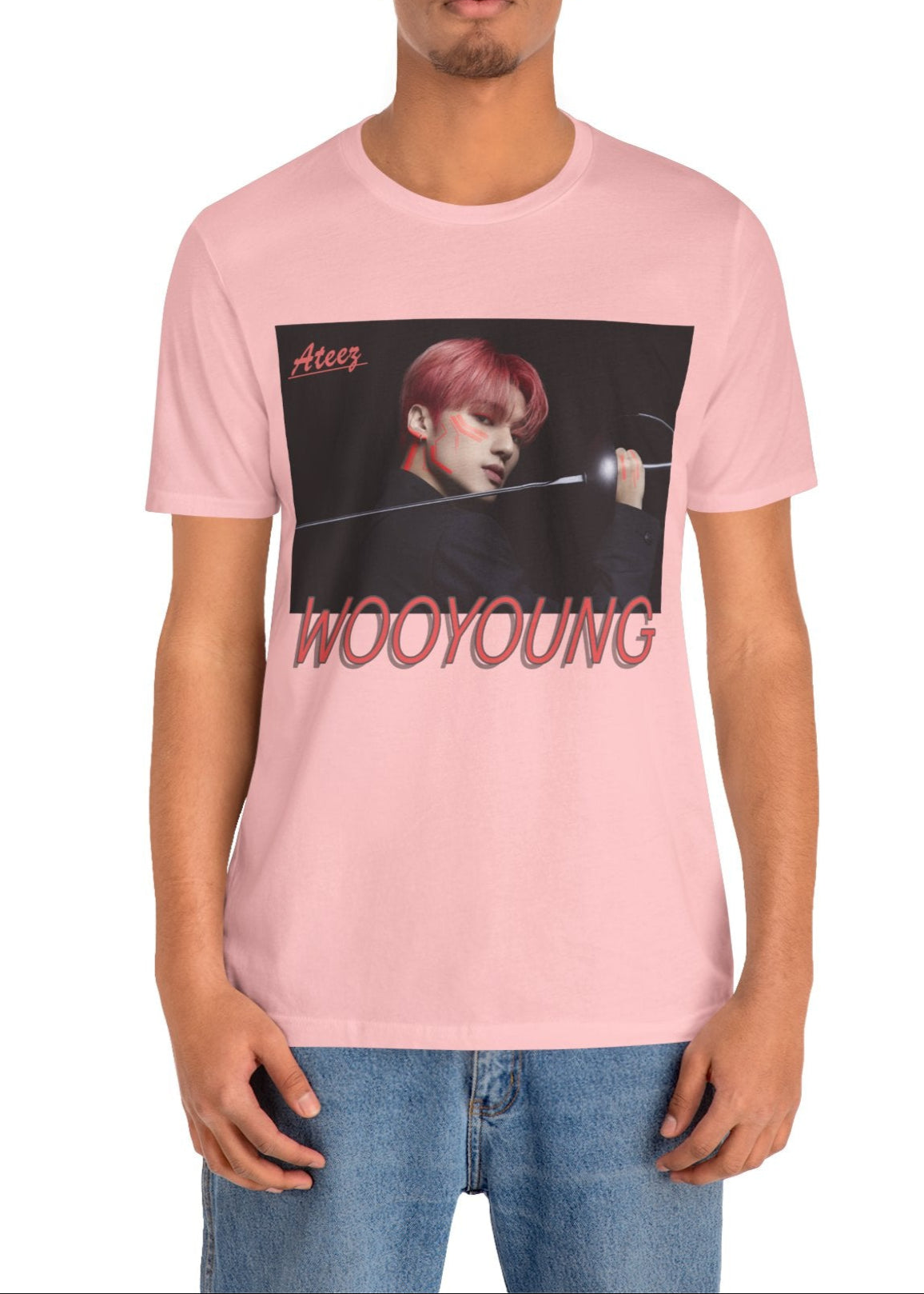 Wooyoung ATEEZ Unisex T-Shirt in pink, featuring a striking design of Wooyoung wielding a sword, his pink-red hair and sharp cheekbones illuminated by dynamic lighting. A must-have for ATINY.