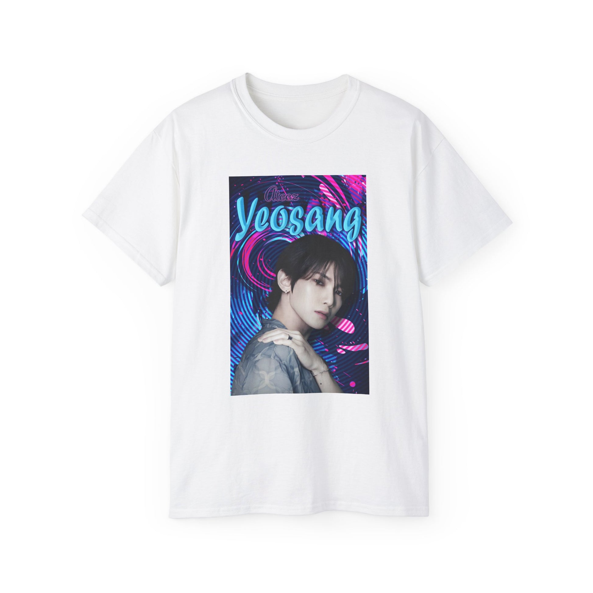 Draped unisex cotton t-shirt in white, featuring a portrait of Yeosang of ATEEZ surrounded by concentric digital lines and flowing paint-like textures. The design blends graffiti-inspired lettering with koi-like motion in blue lagoon and pink hues. From ModeK Vetements.