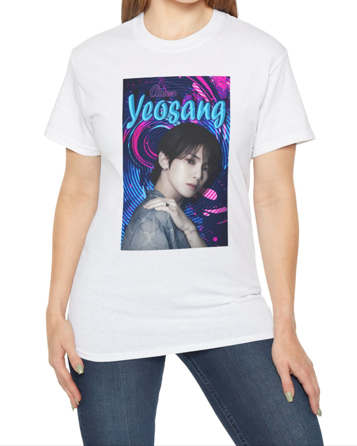 Portrait of Yeosang of ATEEZ surrounded by concentric digital lines and flowing paint-like textures. The design blends graffiti-inspired lettering with koi-like motion in blue lagoon and pink hues, printed on a unisex cotton t-shirt in white. From ModeK Vetements.