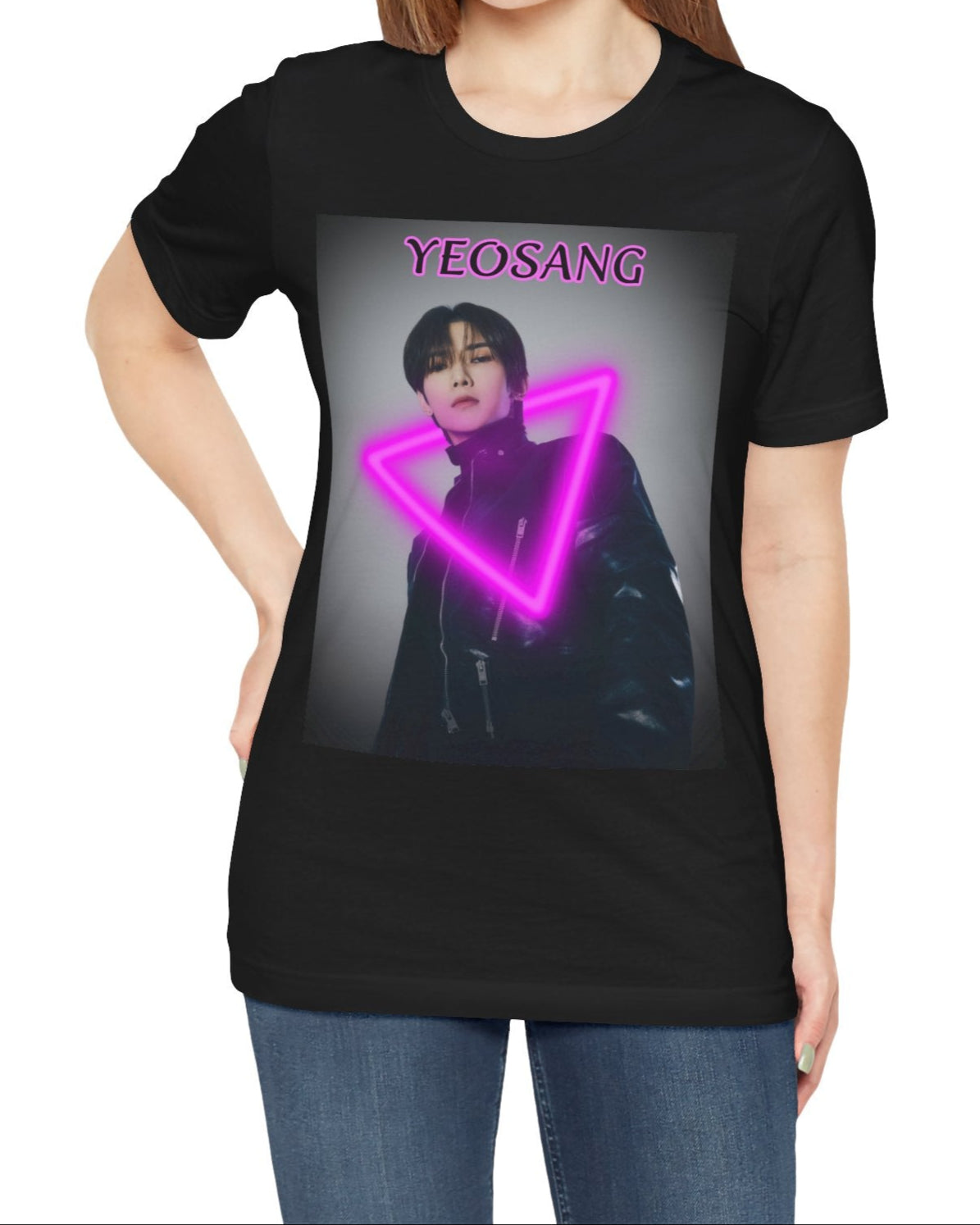 Unisex cotton t-shirt in black, featuring a centered image of Yeosang from ATEEZ wearing a black leather jacket with multiple gunmetal zippers. A glowing fuchsia neon triangle is layered over his silhouette, creating visual tension between form and light. The name "YEOSANG" appears above in matching pink text. ModeK Vetements.