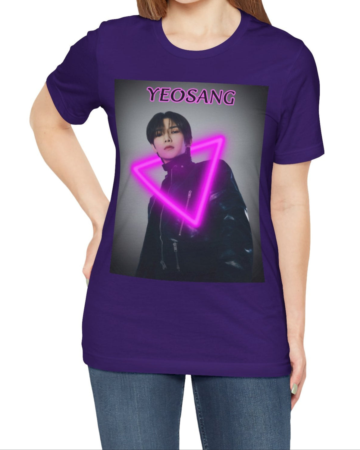Unisex cotton t-shirt in team purple, featuring a centered image of Yeosang from ATEEZ wearing a black leather jacket with multiple gunmetal zippers. A glowing fuchsia neon triangle is layered over his silhouette, creating visual tension between form and light. The name "YEOSANG" appears above in matching pink text. ModeK Vetements.