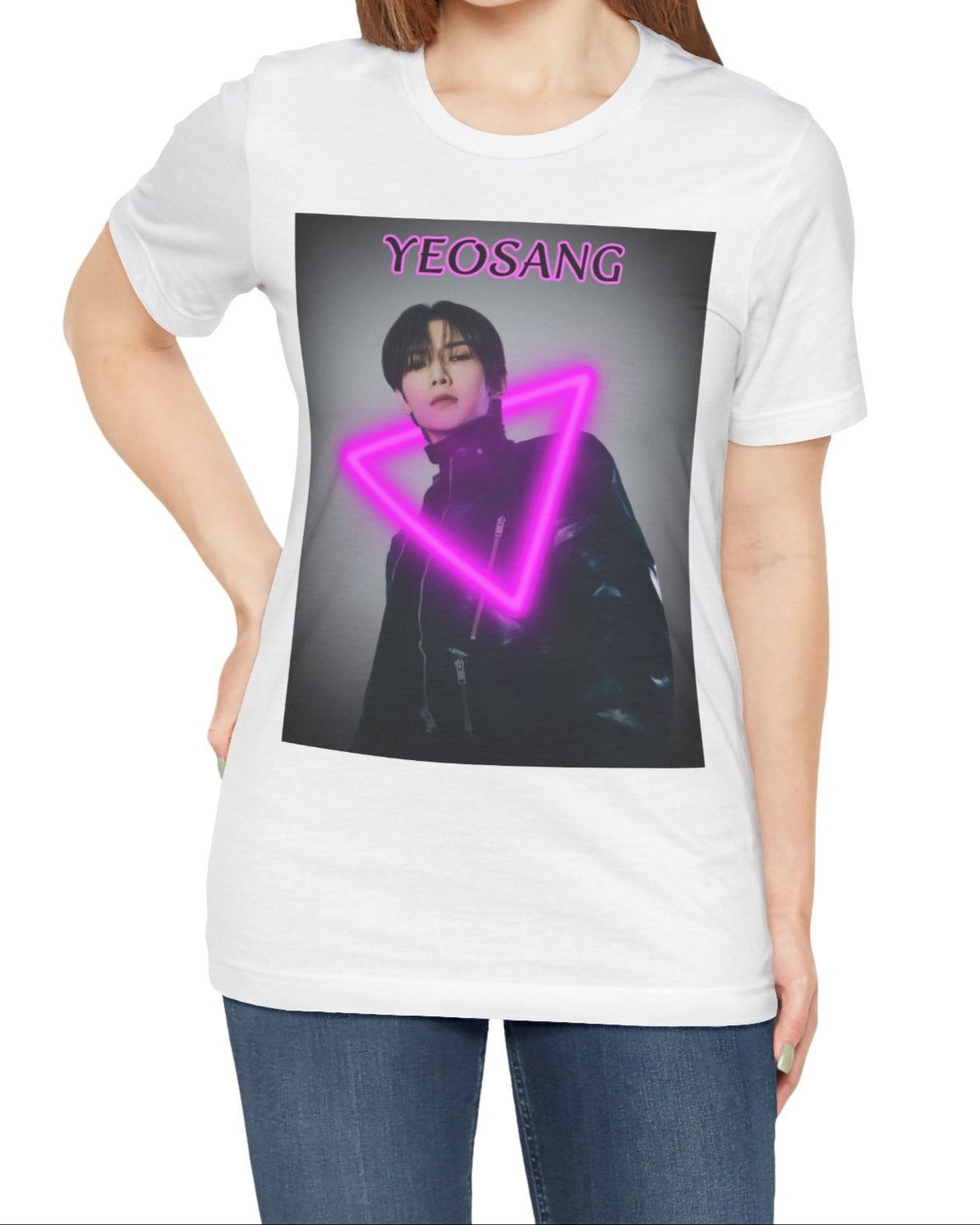 Unisex cotton t-shirt in white, featuring a centered image of Yeosang from ATEEZ wearing a black leather jacket with multiple gunmetal zippers. A glowing fuchsia neon triangle is layered over his silhouette, creating visual tension between form and light. The name "YEOSANG" appears above in matching pink text. ModeK Vetements.
