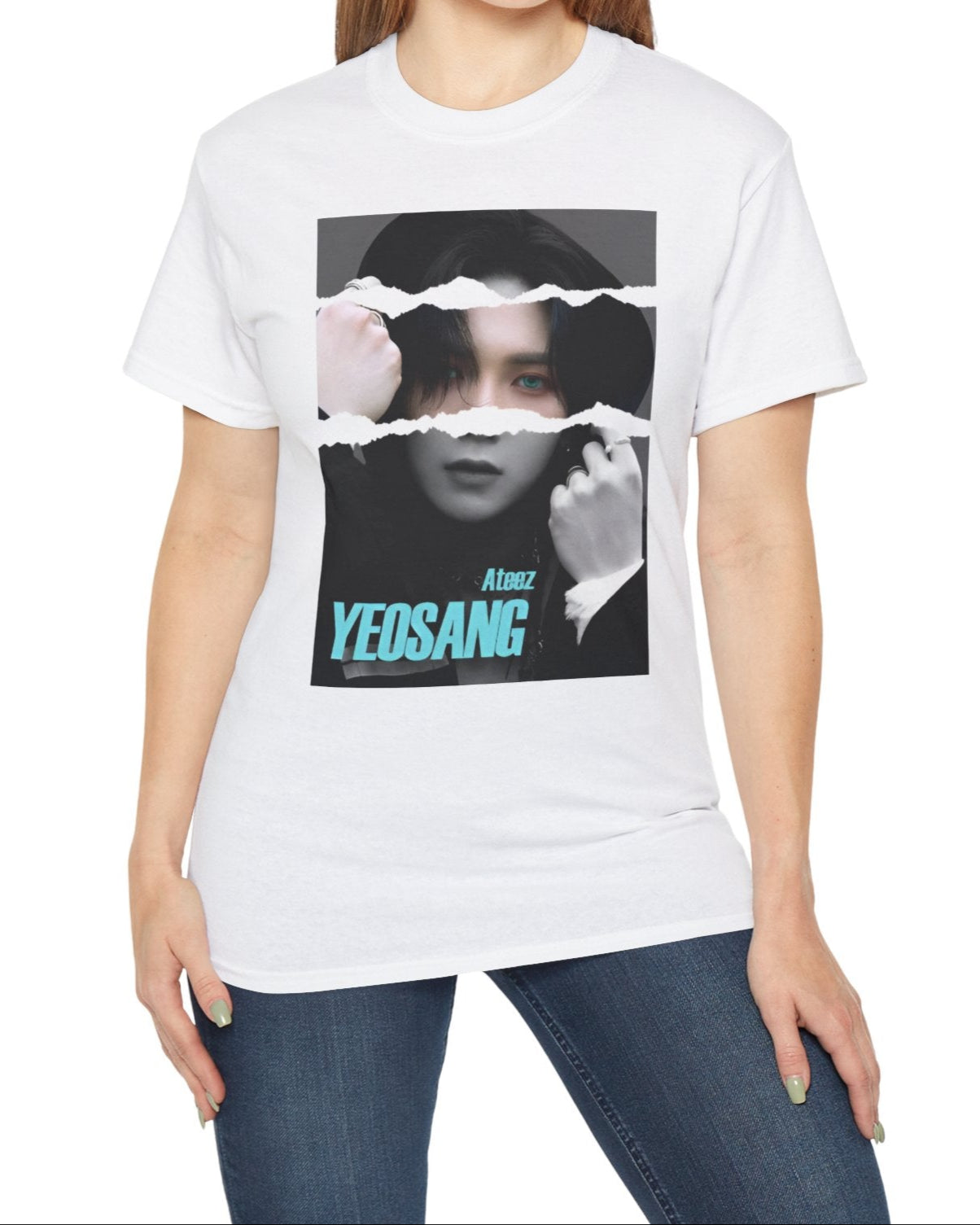 Yeosang ATEEZ graphic unisex t-shirt in white, with a black-and-white portrait featuring a torn-paper effect revealing a single colored strip with turquoise eyes and text. Yeosang is putting a hoodie over his head, creating a quiet, enigmatic presence. From ModeKVetements.