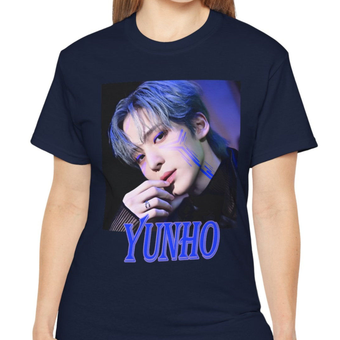 Yunho ATEEZ graphic t-shirt in navy, featuring a blue cyberpunk portrait with glowing circuit-like lines across his cheekbones, matching blue eyelids, silver ring, and transparent sleeve. Styled with cool-toned hair and a futuristic atmosphere. From ModeKVetements.
