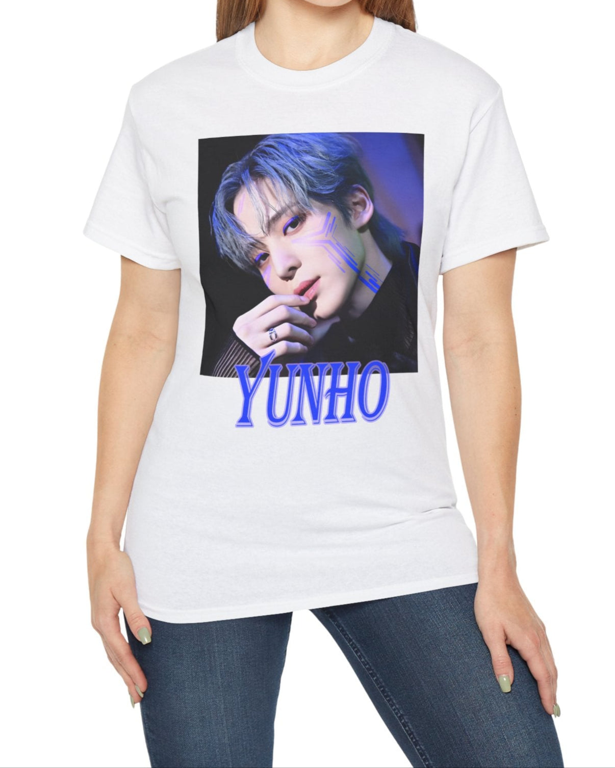Yunho ATEEZ graphic t-shirt in white, featuring a blue cyberpunk portrait with glowing circuit-like lines across his cheekbones, matching blue eyelids, silver ring, and transparent sleeve. Styled with cool-toned hair and a futuristic atmosphere. From ModeKVetements.