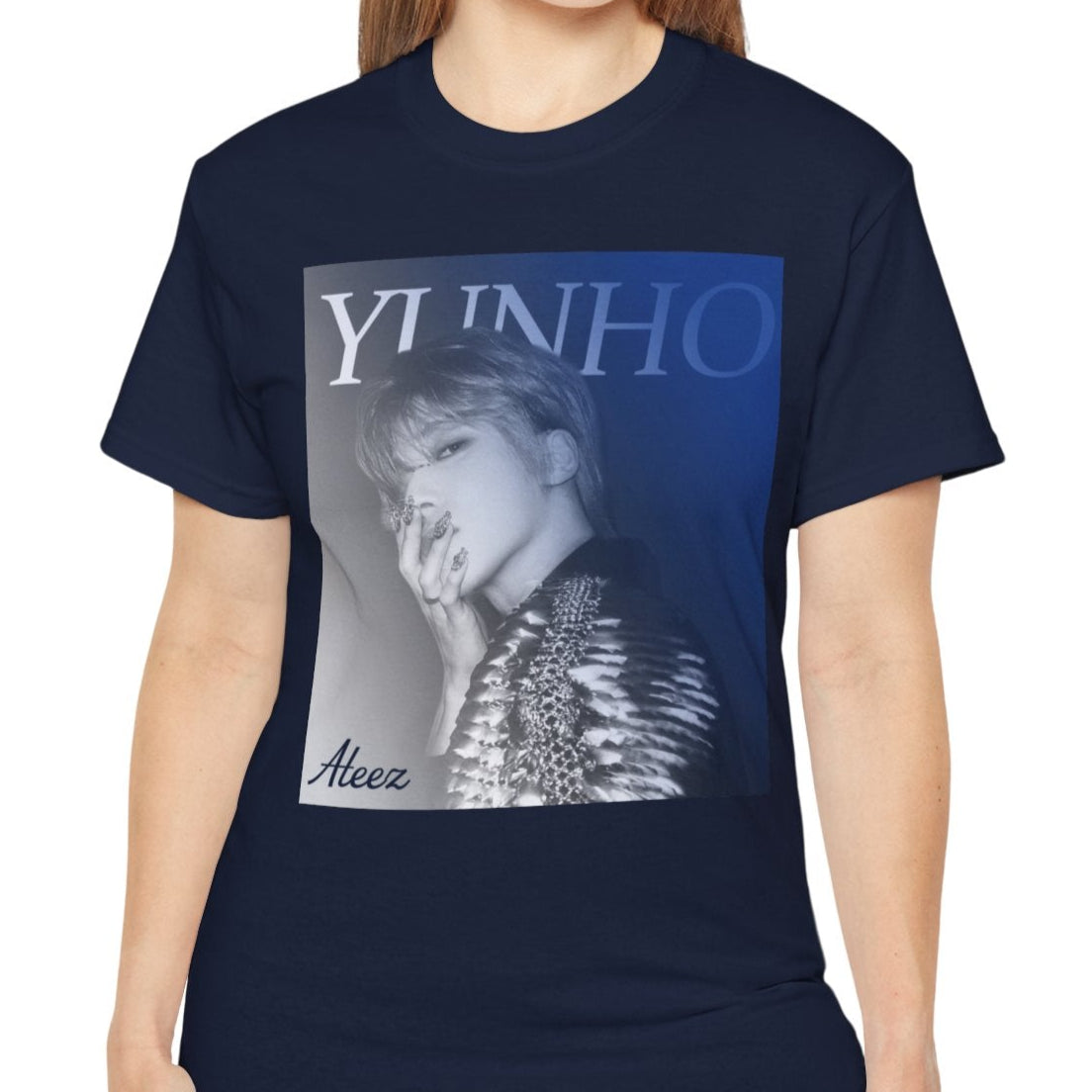 Yunho from ATEEZ printed on a unisex t-shirt in navy, wearing a dramatic metallic epaulette of scales and stones with 3D metallic nail art. A cobalt-to-iron gradient and bold lettering complete the retro aesthetic. From ModeK Vetements.